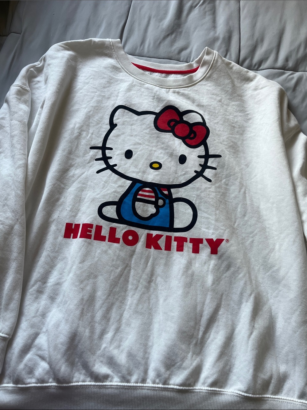 Sanrio Hello Kitty White Sweatshirt with Red Bow and Blue Outfit